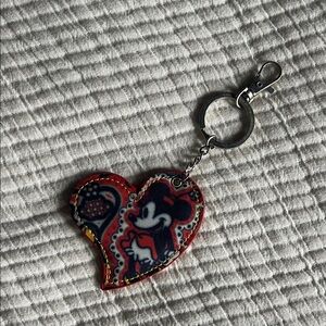 Heart-Shaped Keychain with Cartoon Design